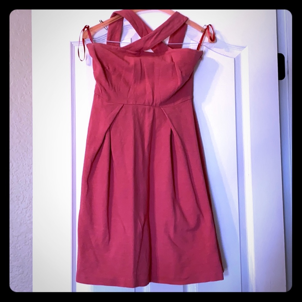 Interesting unique cross cross pink dress